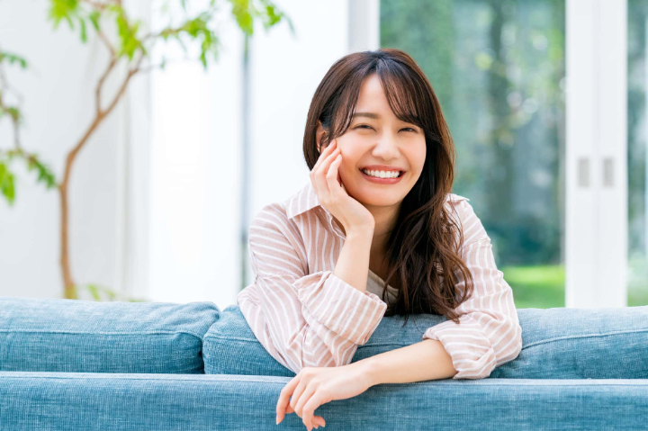 根管治療をして笑顔の女性