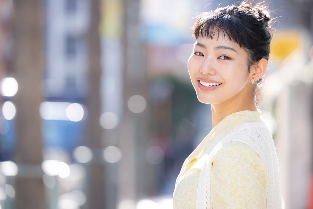 根管治療に満足して微笑む女性